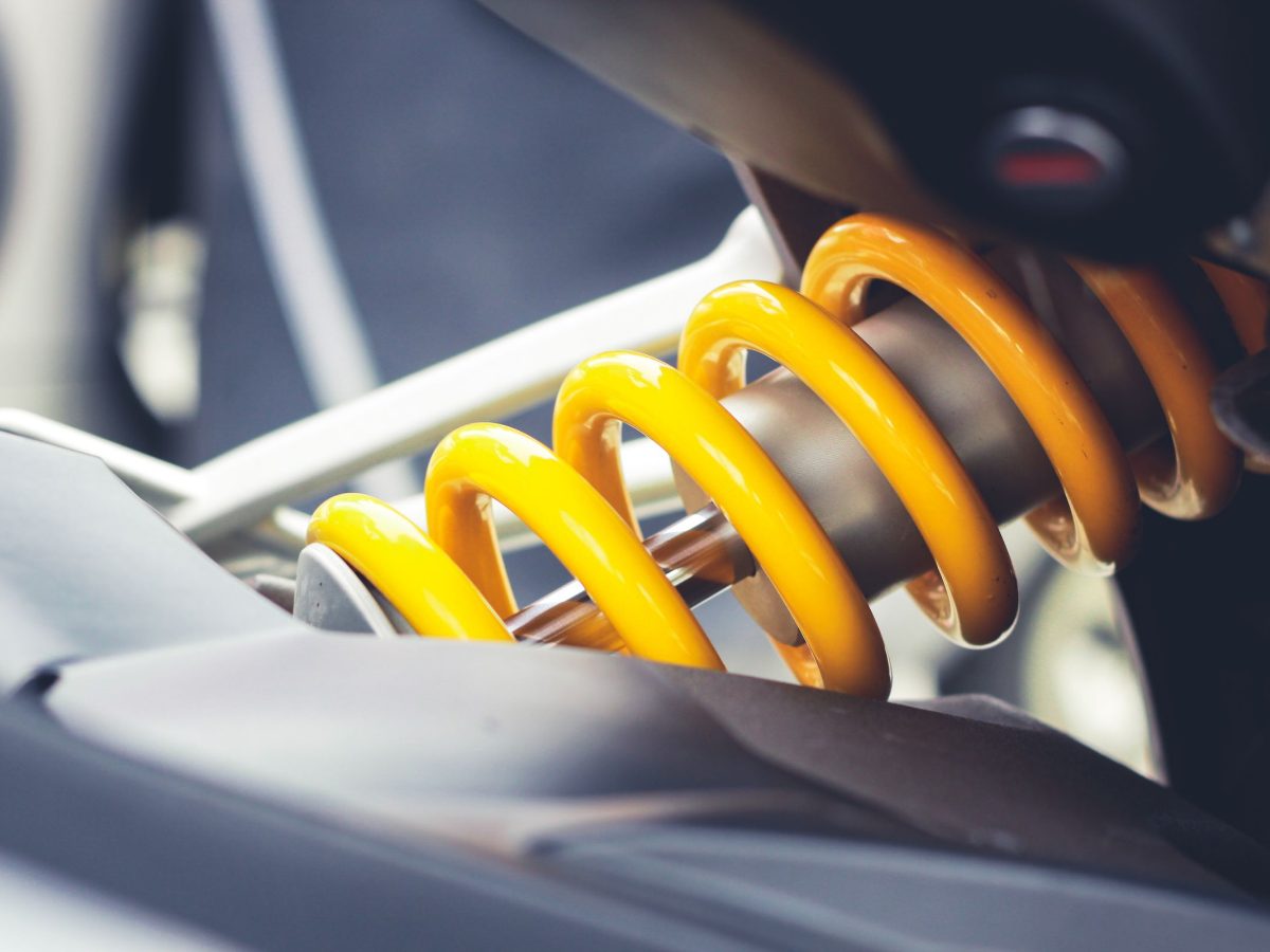 Close-up of a coil-over spring and damper